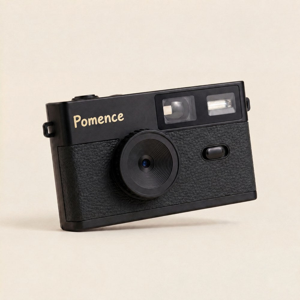 The Pomence Mini Retro Camera in black, front three-quarter packshot
