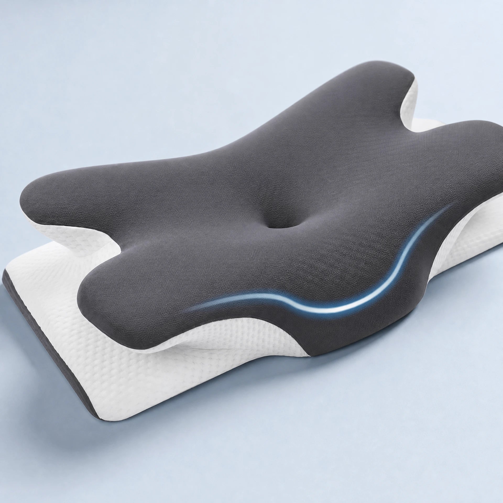 Close-up of the Pomence Memory Neck Pillow showing the central head cradle and raised cervical support roll
