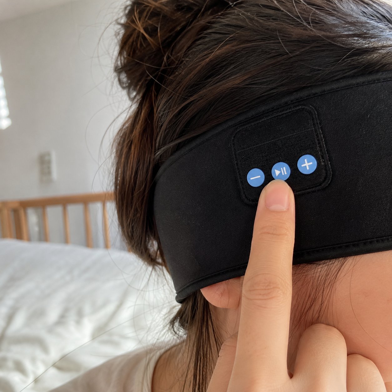 Close-up of the three control buttons on the band
