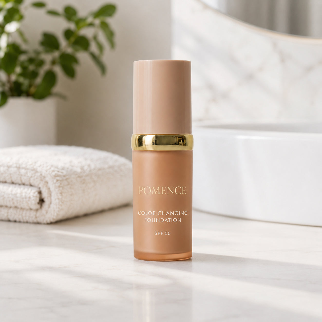 Pomence Color Changing Foundation tube on a bathroom vanity