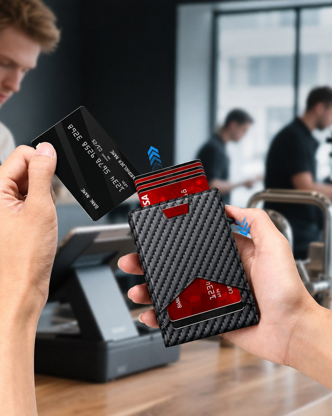 A man pushing the slide on the Pomence RFID Minimalist Bifold Wallet to pop his cards up at a checkout counter