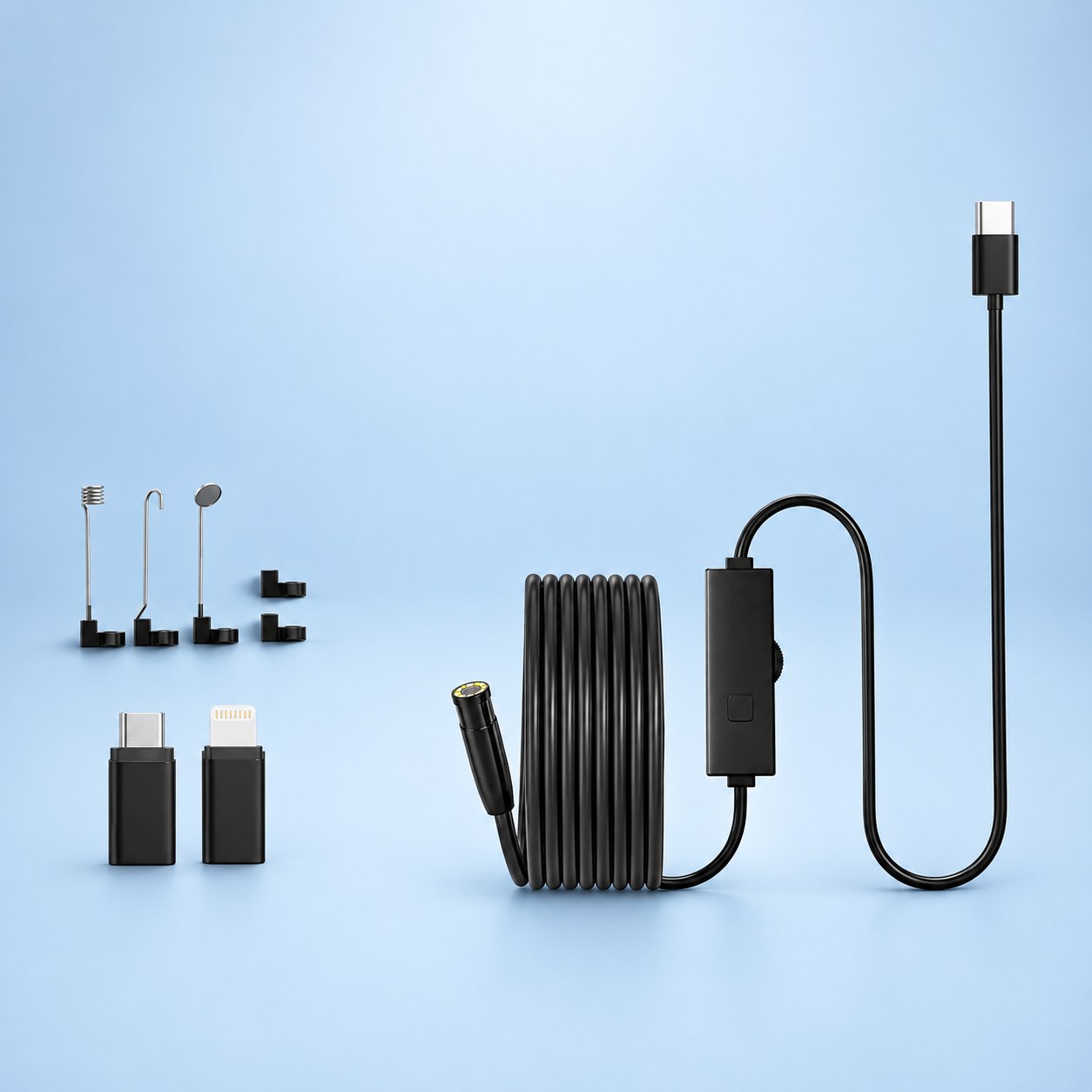 The Pomence Snake Inspection Camera with its coiled cable, phone adapters and tip tools