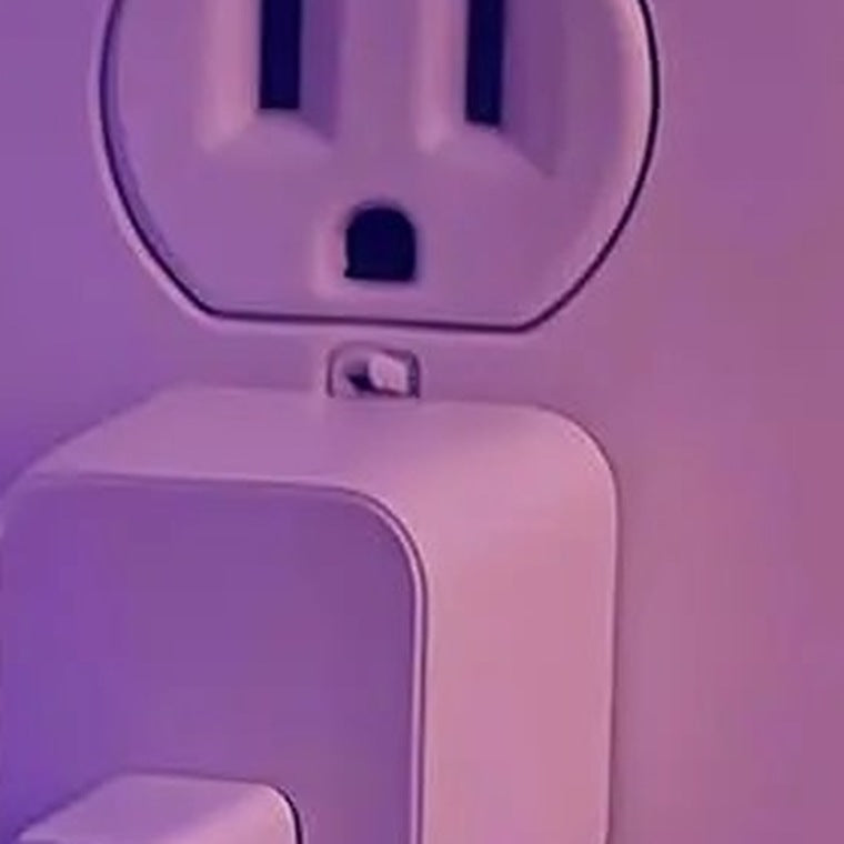 The charging cable plugged into a wall adapter