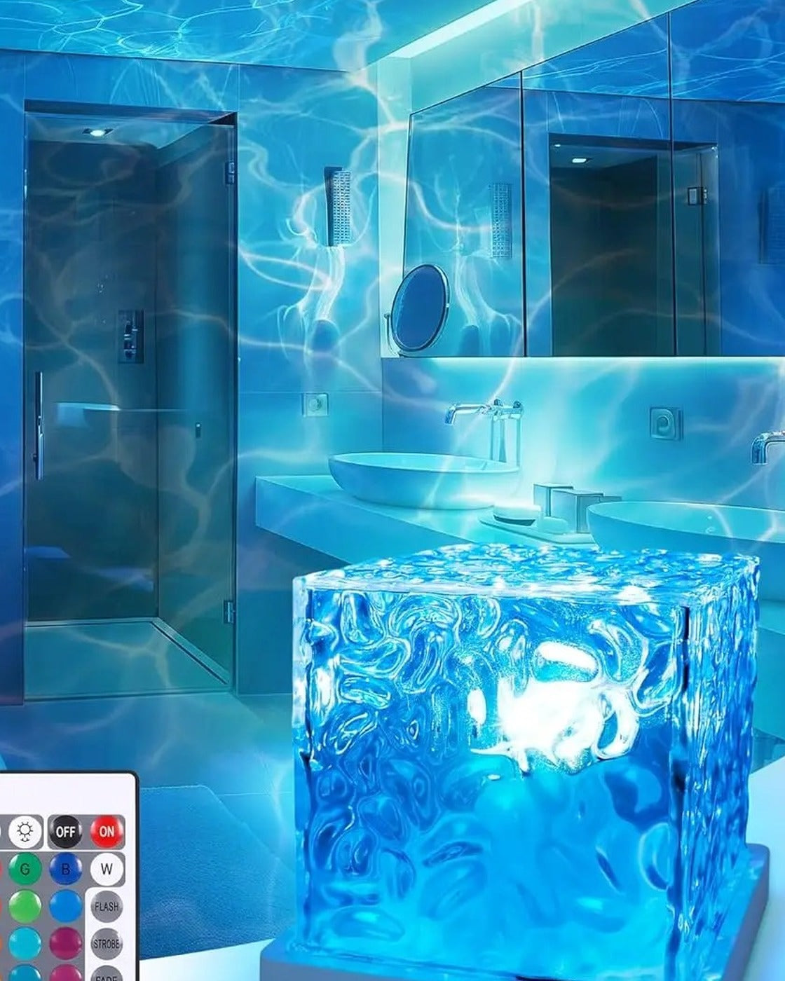 The cube lamp lighting a bathroom in blue with its remote control beside it