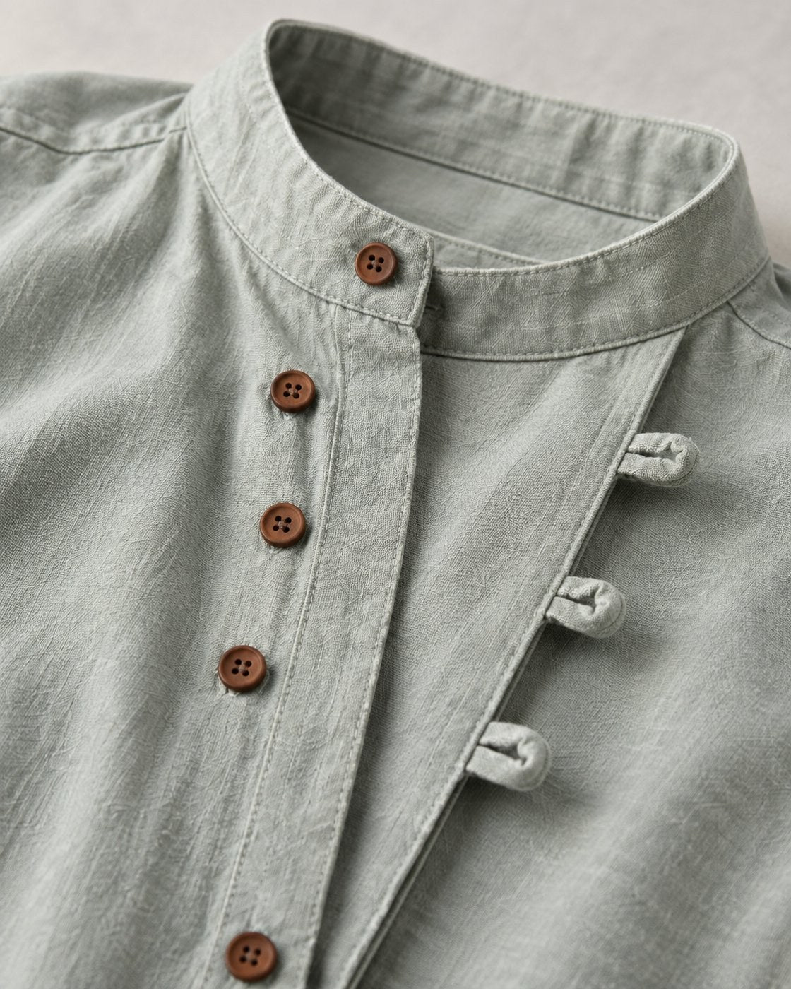 Pomence™ Soft-Touch Band Collar Shirt. Soft-touch band collar shirt, mandarin collar and button placket close-up