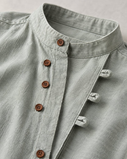 Pomence™ Soft-Touch Band Collar Shirt. Soft-touch band collar shirt, mandarin collar and button placket close-up