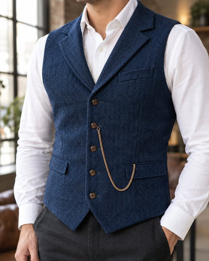 Pomence™ Herringbone Tweed Waistcoat. Pomence Herringbone Tweed Waistcoat worn over a white shirt, three quarter view with the chain, Midnight Navy