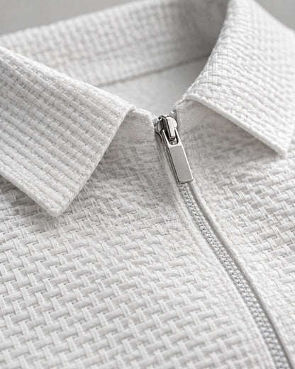 Pomence™ Quarter-Zip Textured Polo. Quarter zip textured polo, close up of the zip placket, ribbed collar and waffle knit