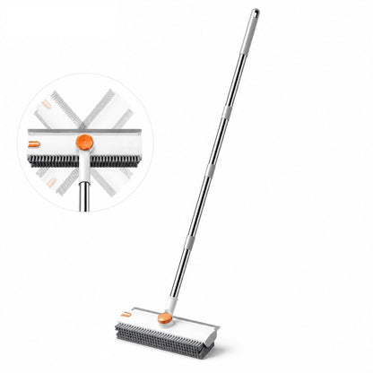 The Pomence 3-in-1 Floor Scrub Brush at full length, with its head turning 360 degrees