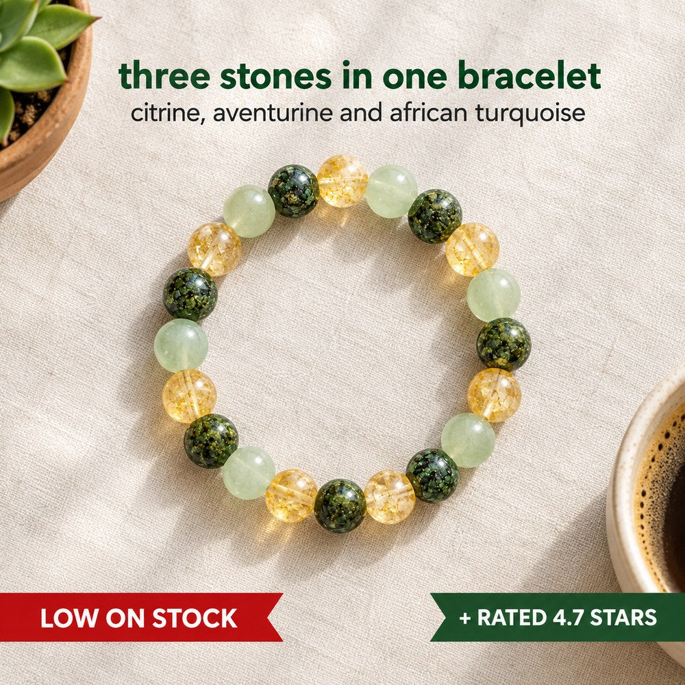 Flat lay of the Pomence Three Stone Abundance Bracelet on pale linen, citrine, green aventurine and African turquoise beads repeating around the cord