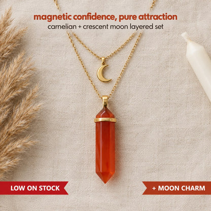 Flat lay of the Pomence Carnelian Attraction Necklace in gold, showing the hexagonal carnelian point and the gold crescent moon charm on its second chain