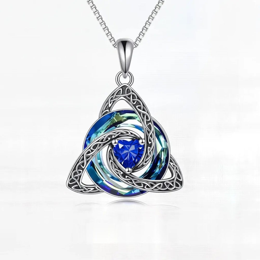 Pomence Birthstone Celtic Knot Necklace with the September Sapphire heart cut crystal