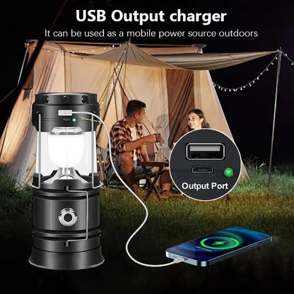 Charging a phone from the lantern's USB output port at a campsite