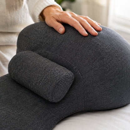 Close-up of the curved wedge shape and knit fabric of the Pomence Couples Comfort Pillow