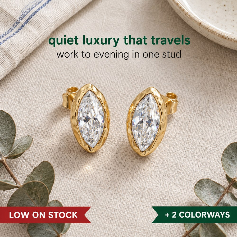 Pomence Crystal Mini Stud Earrings, a pair of marquise cut crystal studs in hammered 18K gold plated bezels