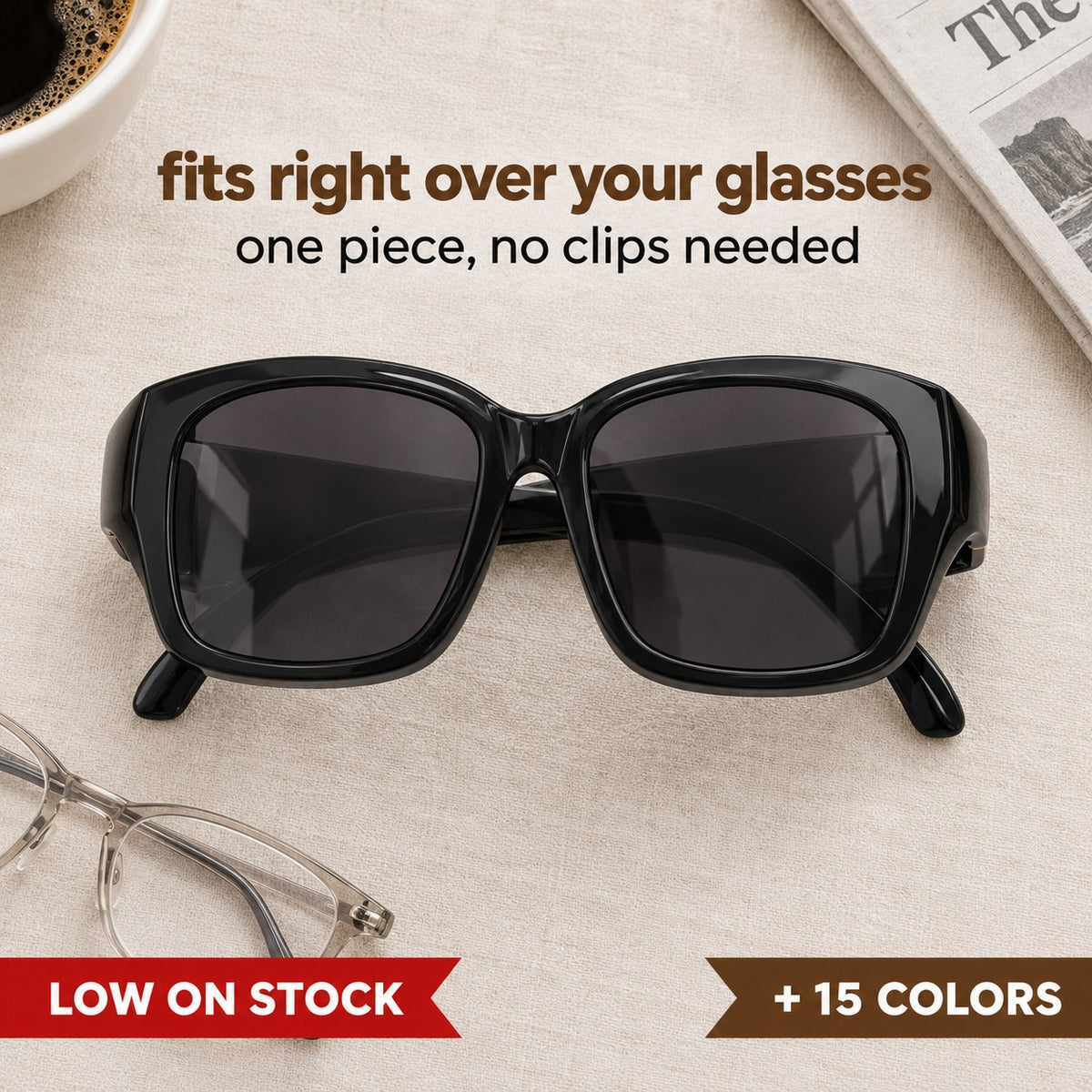 Pomence Fit-Over Sunglasses laid flat, an oversized square frame built to sit over prescription glasses