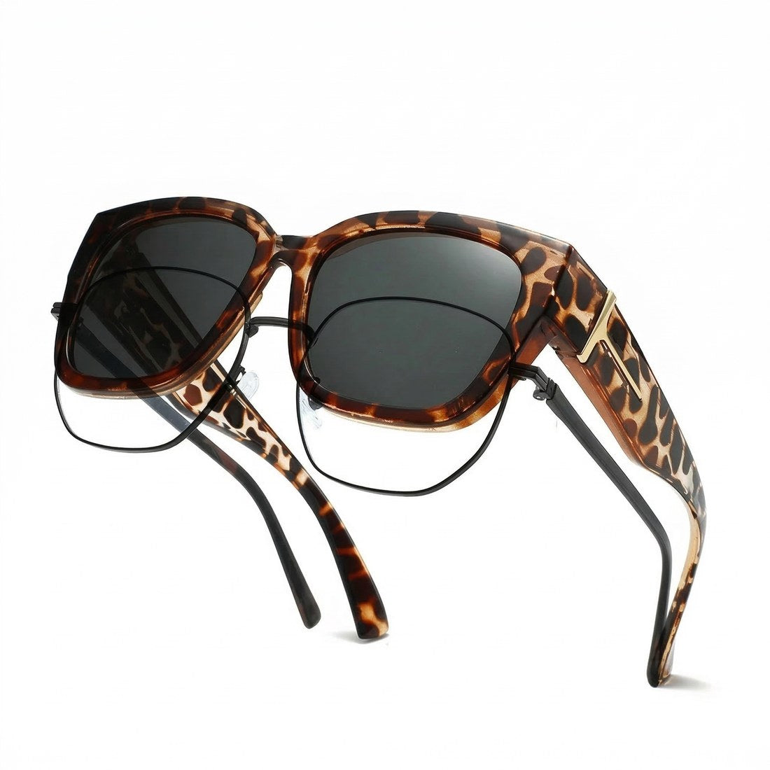 Pomence Fit-Over Sunglasses in the Cheetah colorway, an oversized square frame built to sit over prescription glasses