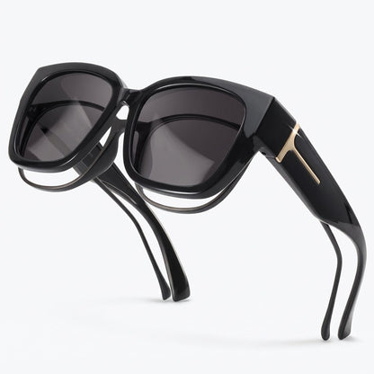 Pomence Fit-Over Sunglasses in the Midnight colorway, an oversized square frame built to sit over prescription glasses