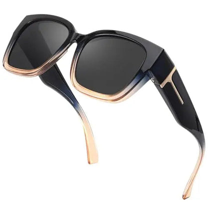 Pomence Fit-Over Sunglasses in the Onyx colorway, an oversized square frame built to sit over prescription glasses
