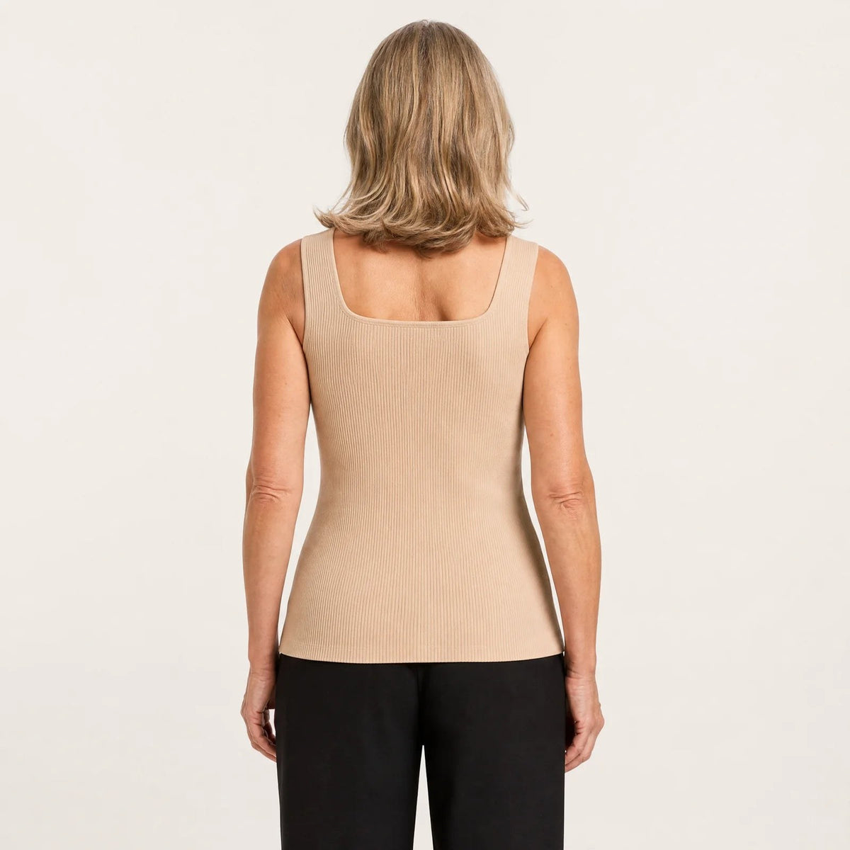Back view of the Pomence Front-Support Bra Tank in Beige: no back band, a smooth back
