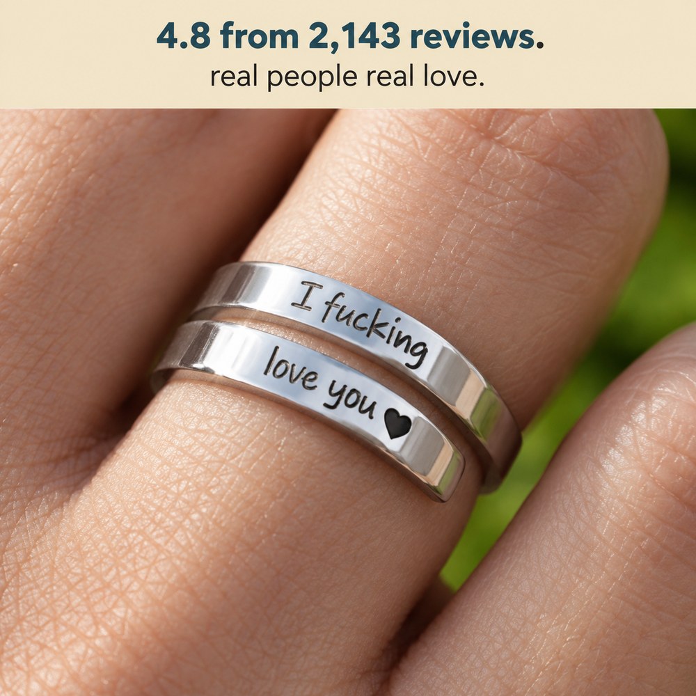 Macro of the Pomence I F♡cking Love You Ring worn on a finger with both engraved lines legible