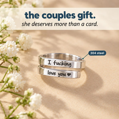 The Pomence I F♡cking Love You Ring staged as a gift with white flowers