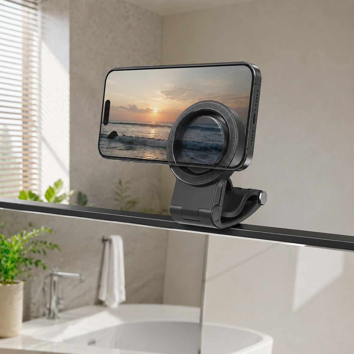 Pomence™ Magnetic Car Phone Mount. Clipped onto a bathroom mirror edge holding a phone, multi-scene use