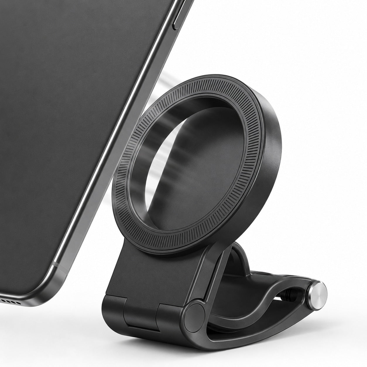 Pomence™ Magnetic Car Phone Mount. Macro of a phone approaching the magnetic ring, strong magnetic hold