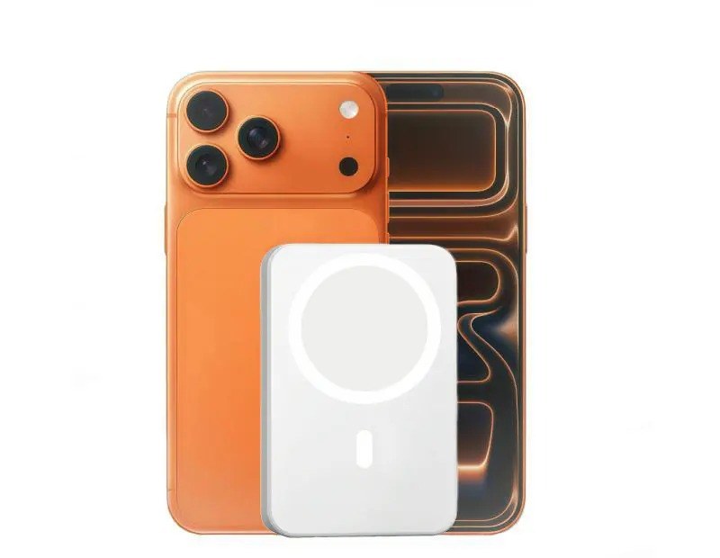 Pomence™ Magnetic Wireless Power Bank. Pomence Magnetic Wireless Power Bank snapped to the back of a phone