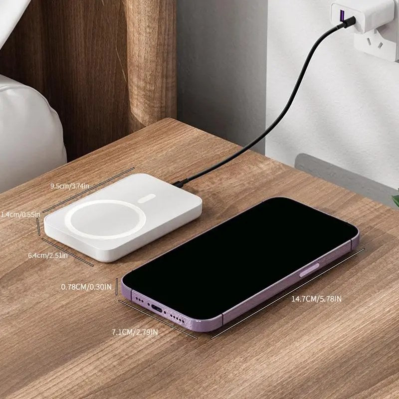 Pomence™ Magnetic Wireless Power Bank. Pomence Magnetic Wireless Power Bank actual size next to a phone