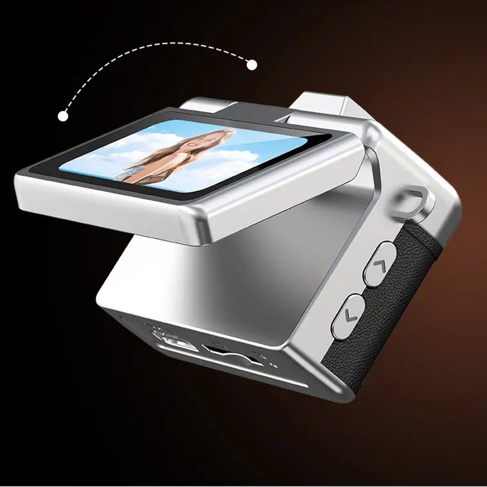 The Pomence Mini Keychain Camera with its screen flipped up 180 degrees for a selfie