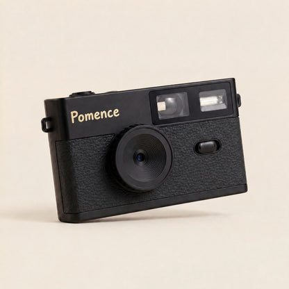 The Pomence Mini Retro Camera in black, front three-quarter packshot