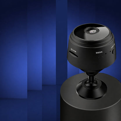 Pomence Mini WiFi Security Camera on its magnetic stand, clean product view