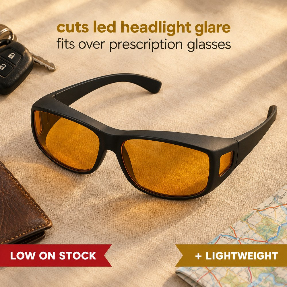 The Pomence Night Driving Glasses, amber polarized lenses in a matte black wrap frame, shown alone