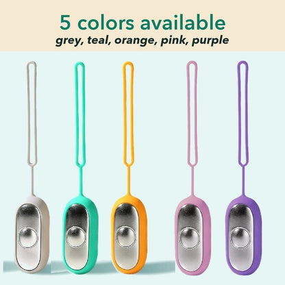 All five Palm Calm Fidget colors together: Grey, Teal, Orange, Pink and Purple, each with a mirror polished silver faceplate