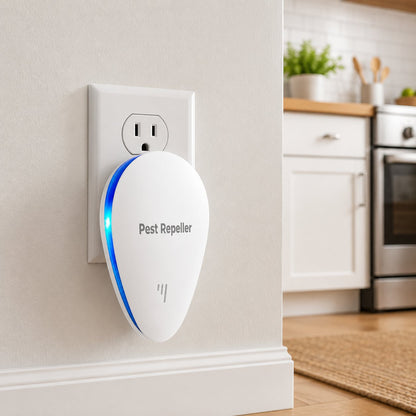 Pomence Pest Repeller plugged into a kitchen wall outlet