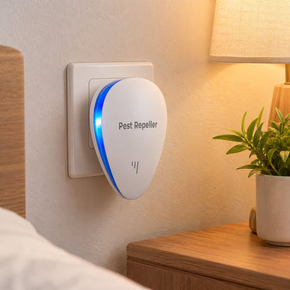 Pomence Pest Repeller plugged into a bedroom wall outlet