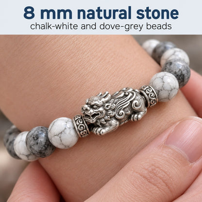 Macro of the 8 mm natural white and grey turquoise beads on the Pomence Pixiu Wealth Bracelet