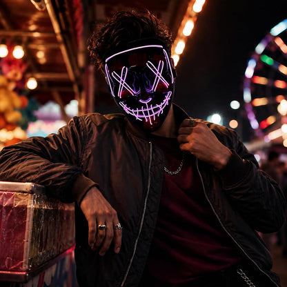 LED light-up Halloween mask worn at a night party