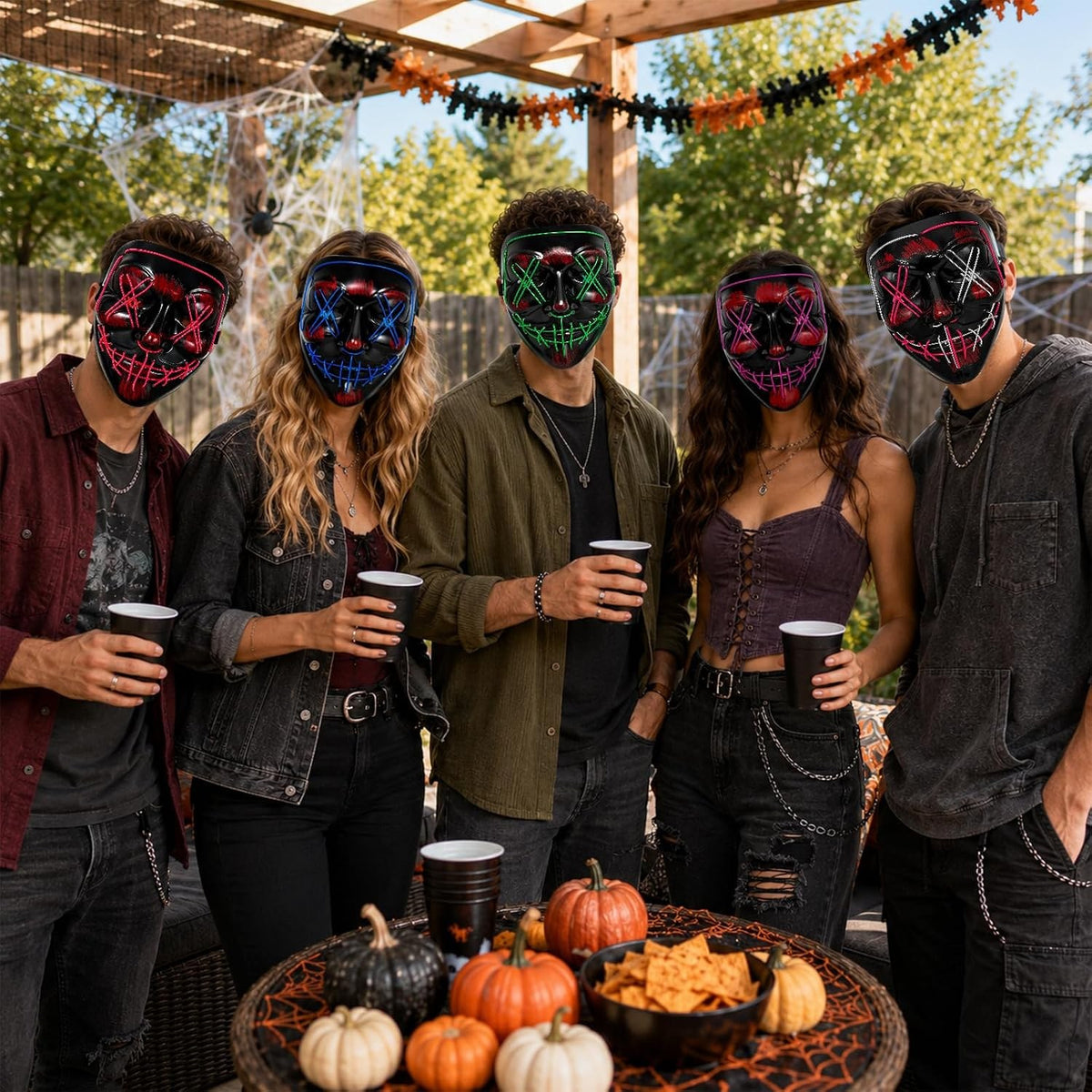 Group wearing LED light-up Halloween masks in different glow colors