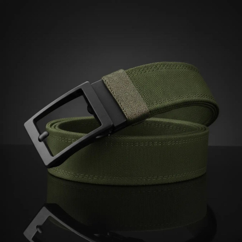 The Pomence Ratchet Tactical Belt in Army Green, coiled packshot with the matte black metal buckle