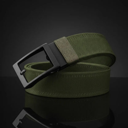 The Pomence Ratchet Tactical Belt in Army Green, coiled packshot with the matte black metal buckle