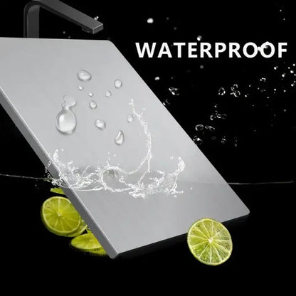 Pomence™ Stainless Steel Chopping Board. Water beading and splashing off the non porous steel surface