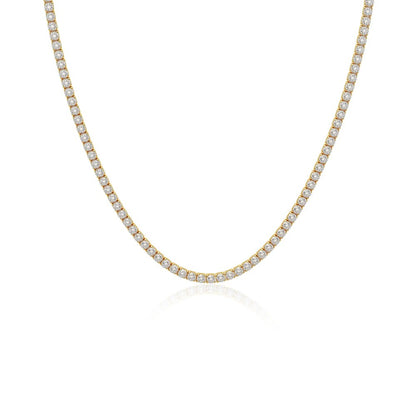 The Pomence Tennis Necklace alone on a plain ground, gold plated finish, lobster clasp and extender visible