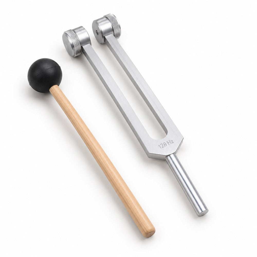 The Pomence 128 Hz Weighted Tuning Fork and its wooden mallet alone on a plain near white ground