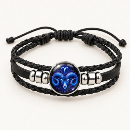 The Pomence Zodiac Leather Bracelet alone in an open loop with the glass zodiac dome facing the camera and the sign legible