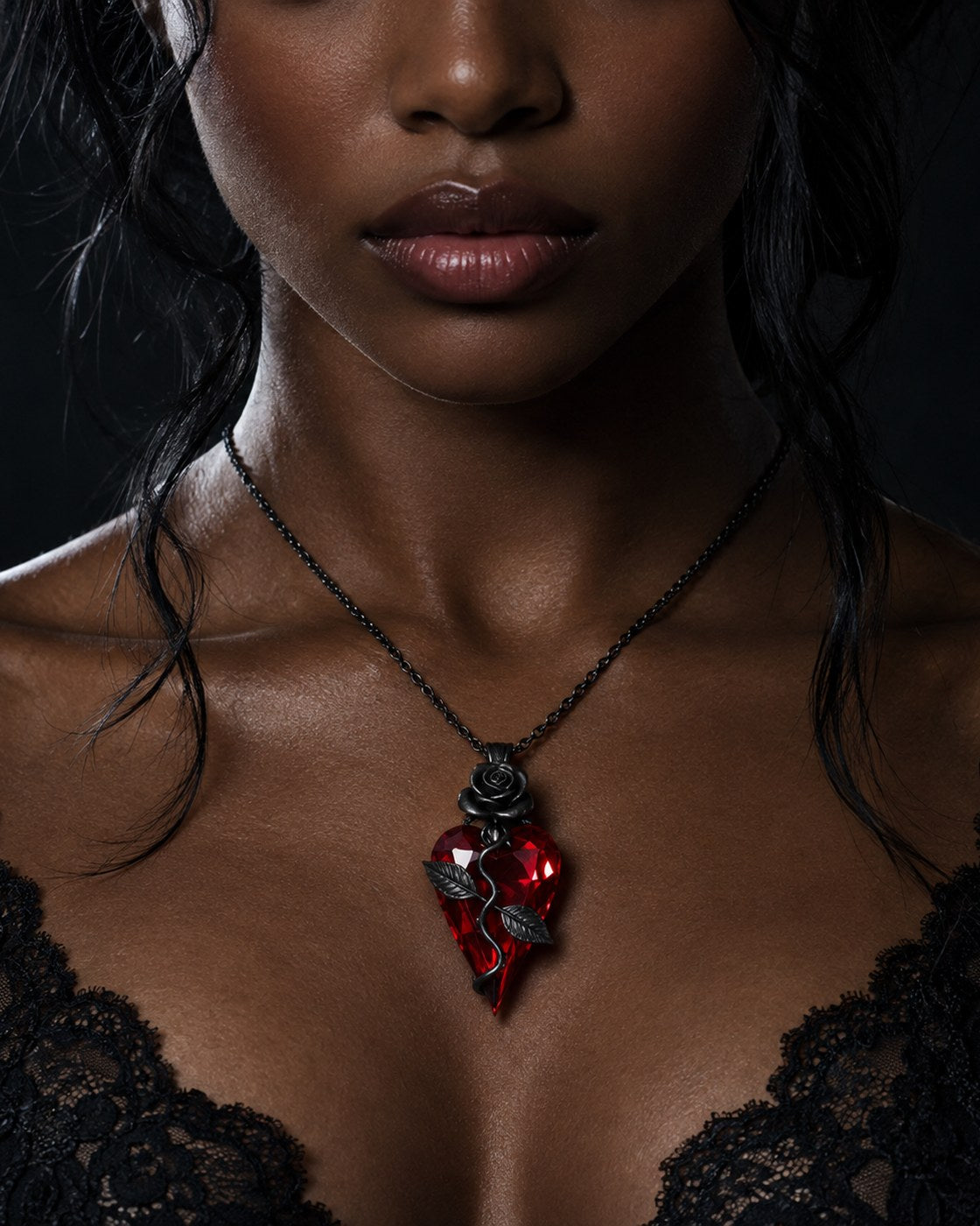 A young woman wearing the Pomence Blood Rose Necklace at her collarbone