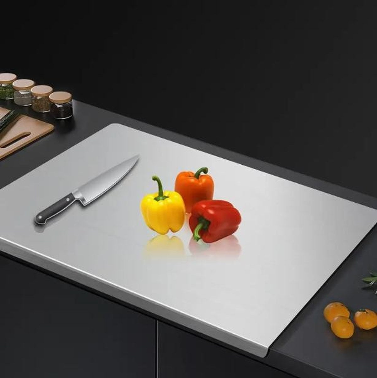 The Pomence Stainless Steel Chopping Board set up on a counter ready to prep vegetables