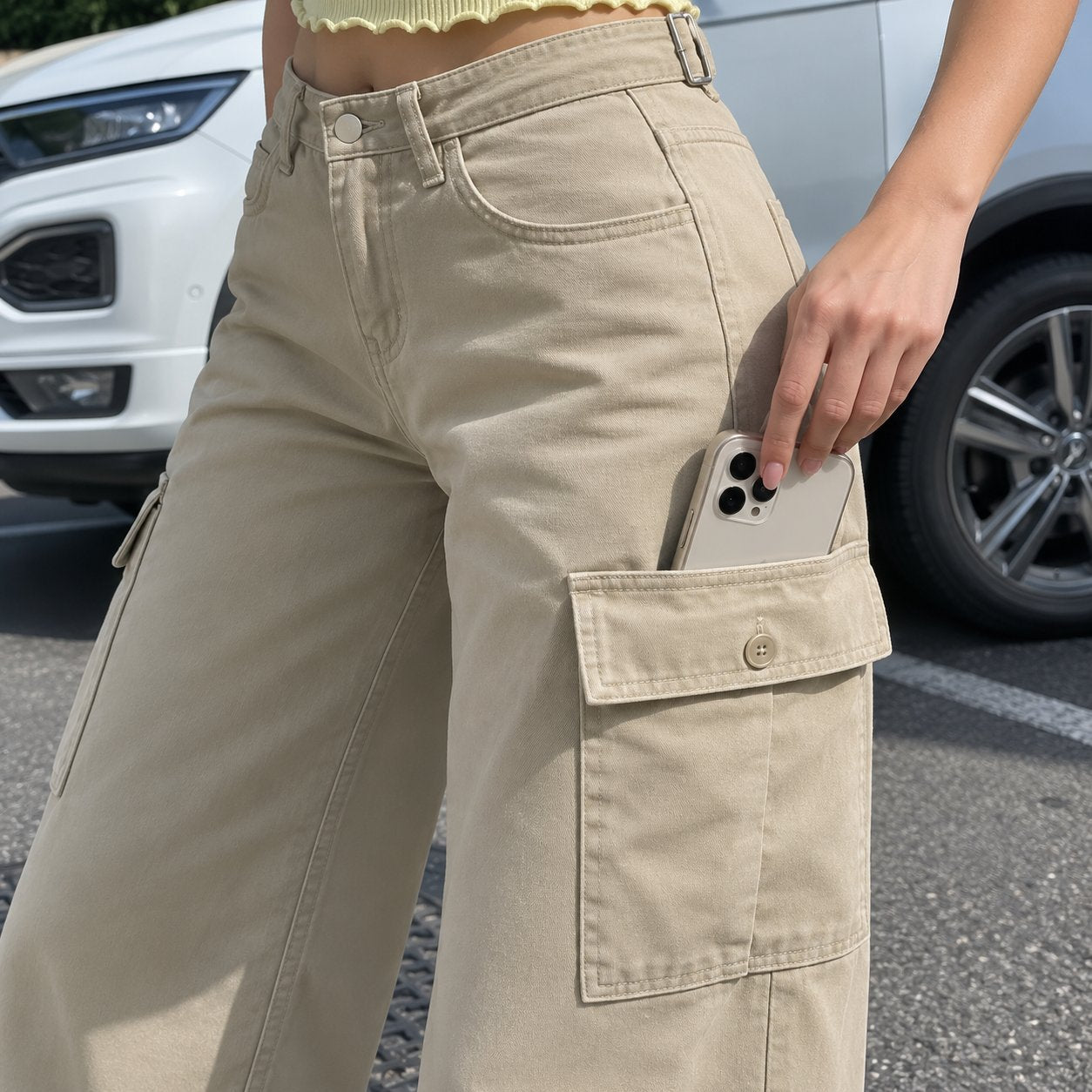 Close-up of the thigh flap cargo pocket with its button