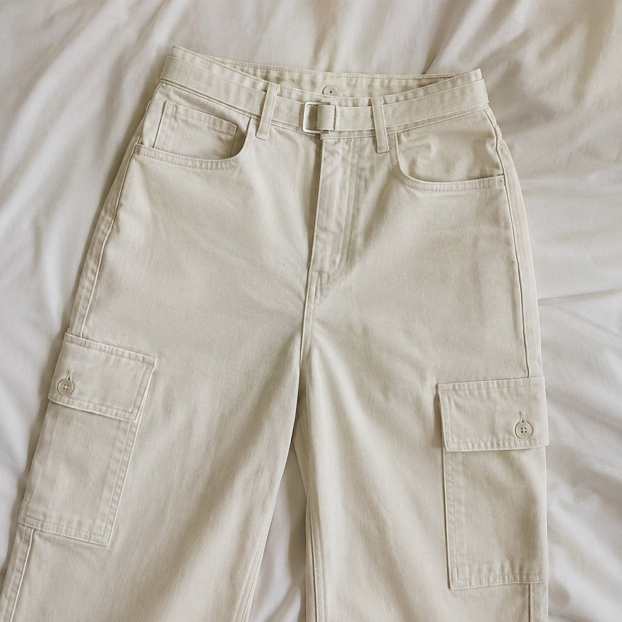 Close-up of the front zipper fly and button closure